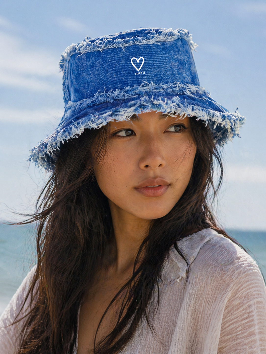 Blue very frayed bucket hat detail