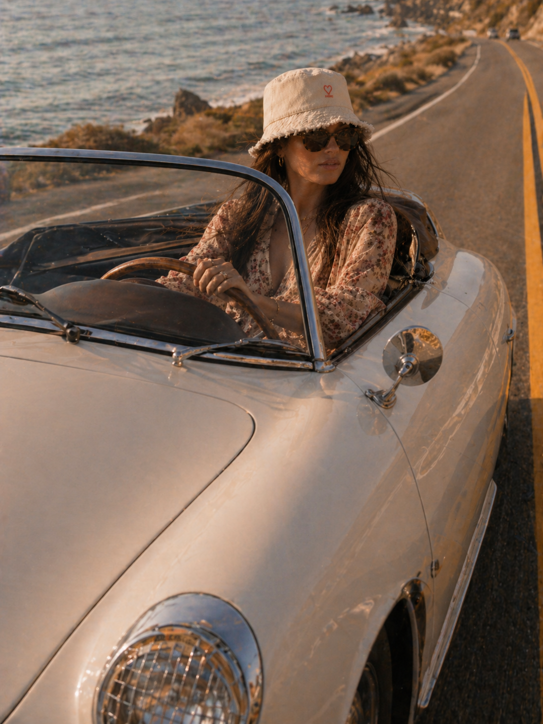 White frayed bucket hat in Malibu car scene